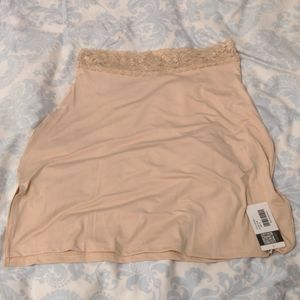 Nude mini skirt slip